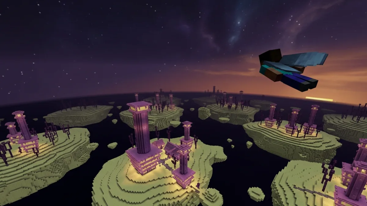 A Minecraft player gliding on elytra above the pale outer End islands